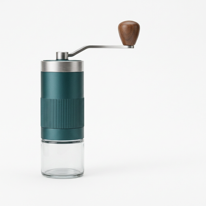 Assembled teal manual coffee grinder isolated on a white background